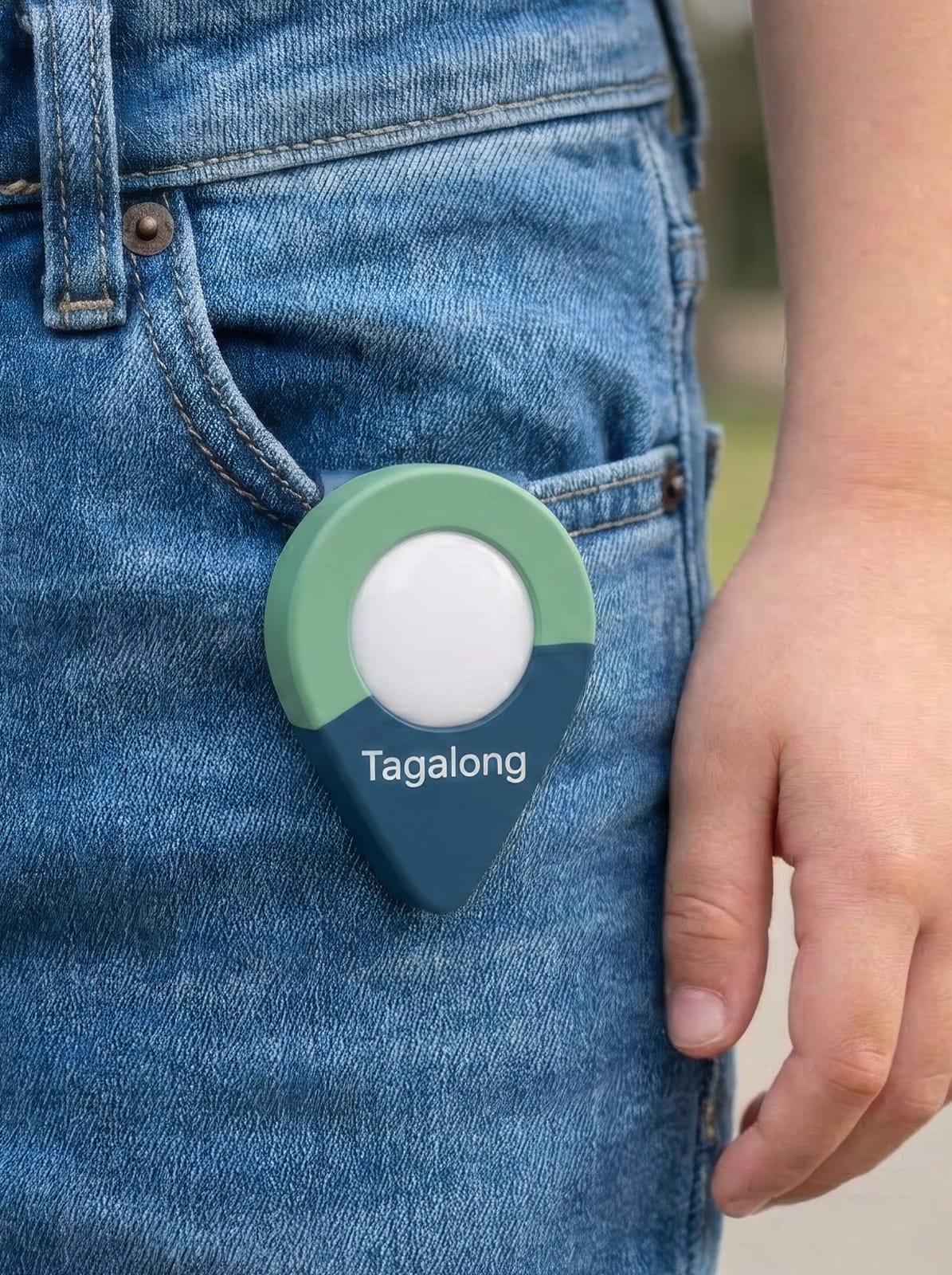 Tagalong tag clipped to a child's jeans pocket, real-life scale